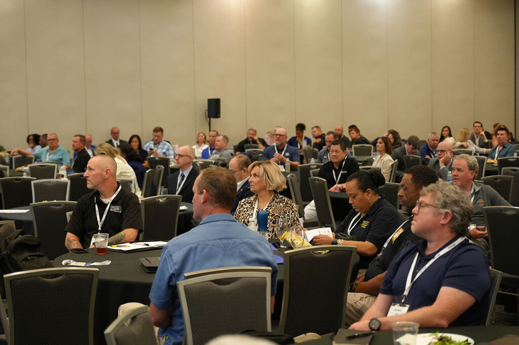 Attendees seated in rows during a Summit breakout session