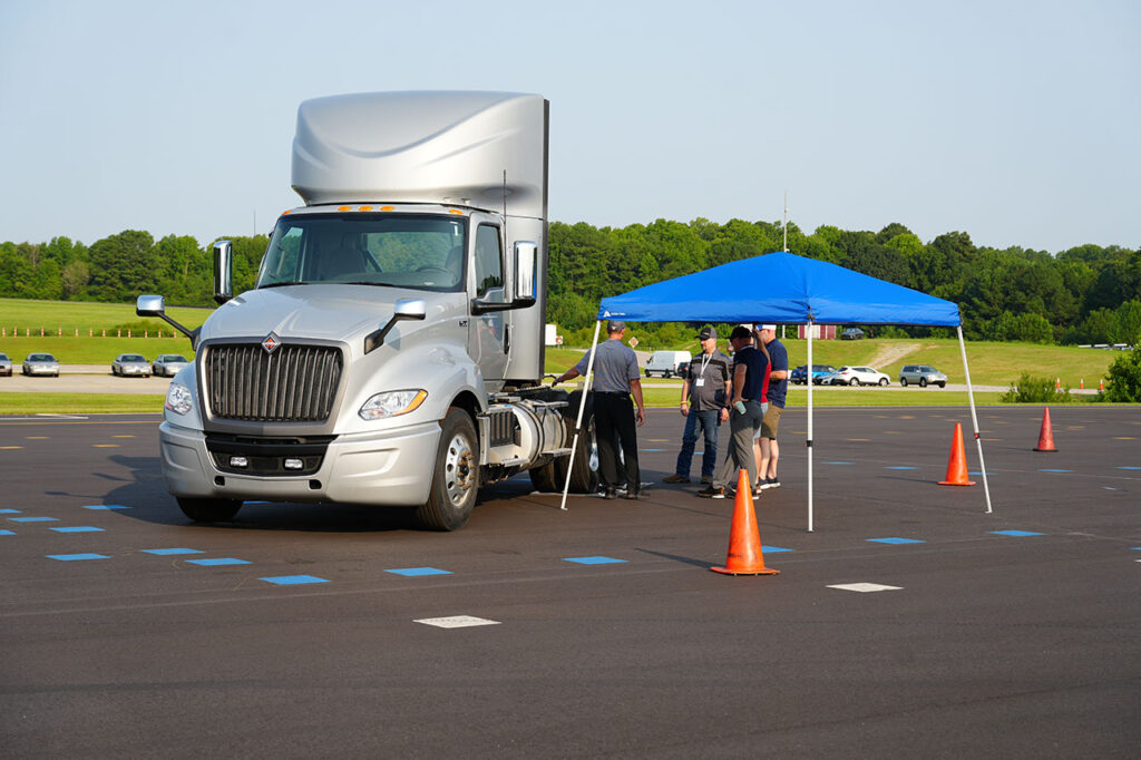 Silver commercial truck displayed on the Technology Showcase course