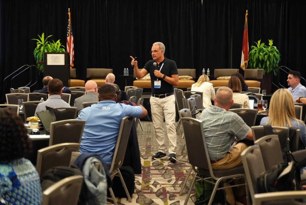 A speaker addresses an audience at the Southeast CMV Safety Summit