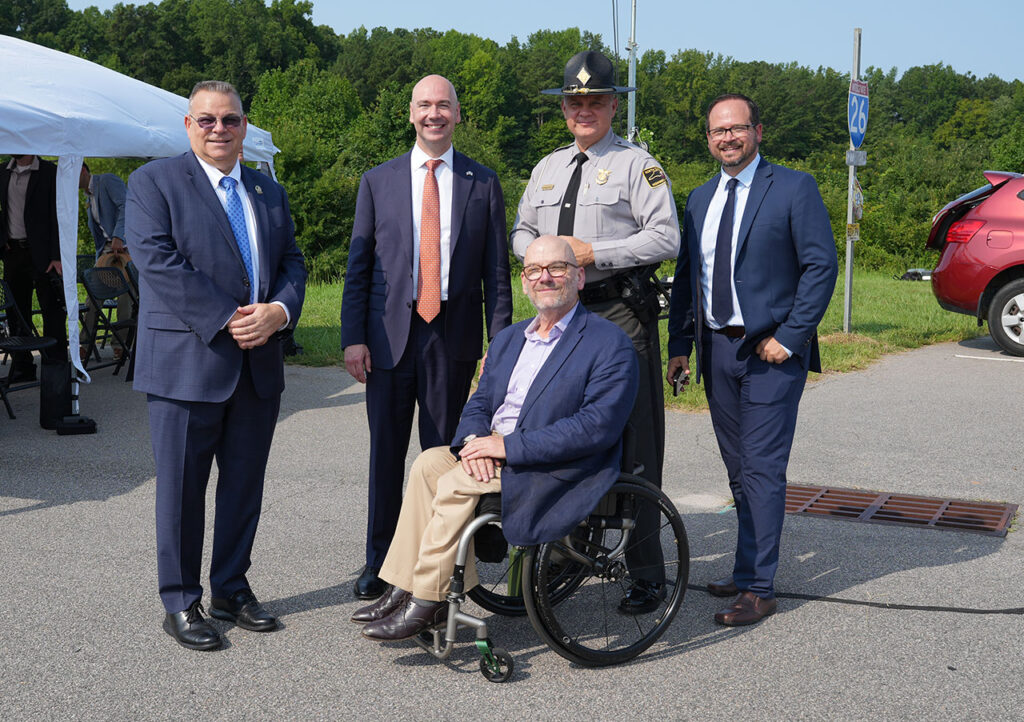 Summit leaders and special guests posing together outdoors